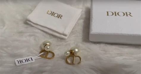 dior ring rose des vents fake|dior earrings real or fake.